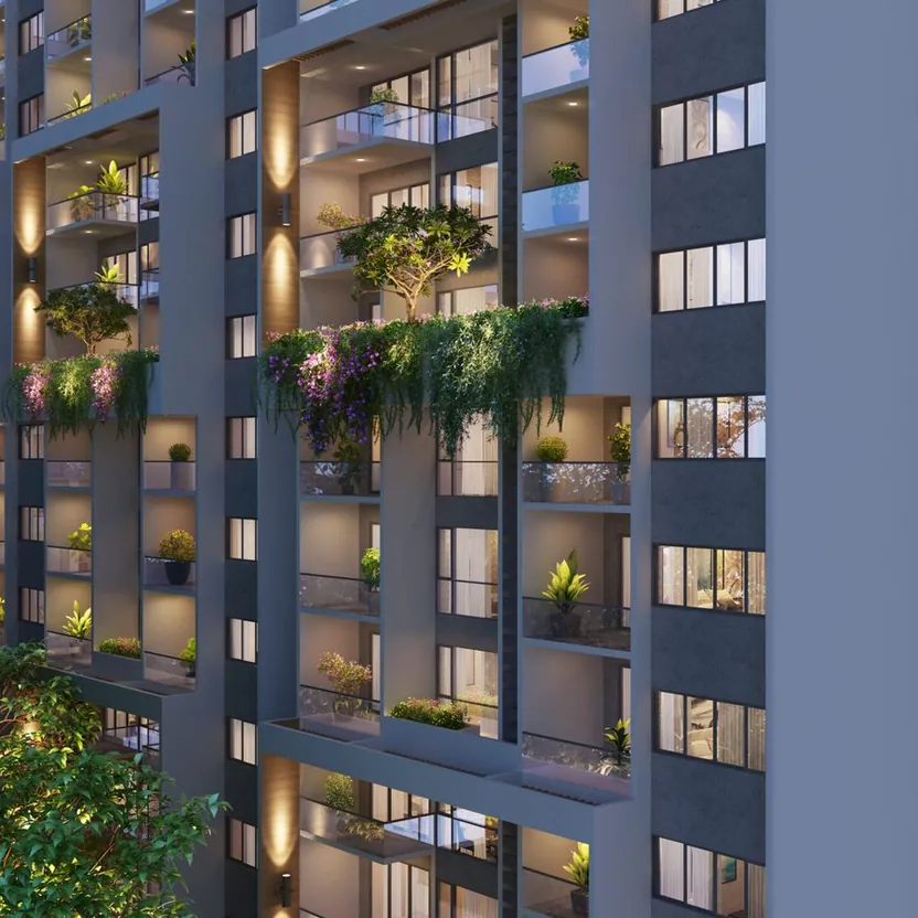 Towers lit at dusk, their planted balconies forming a vertical garden, at ELV HighGarden